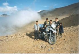 nomad children with high-tech toy